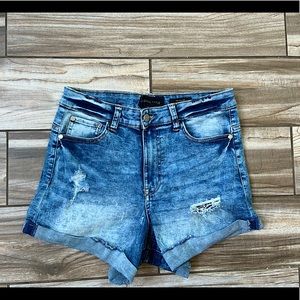 I’m selling Kendall + Kylie short shorts they are a cute blueish color.